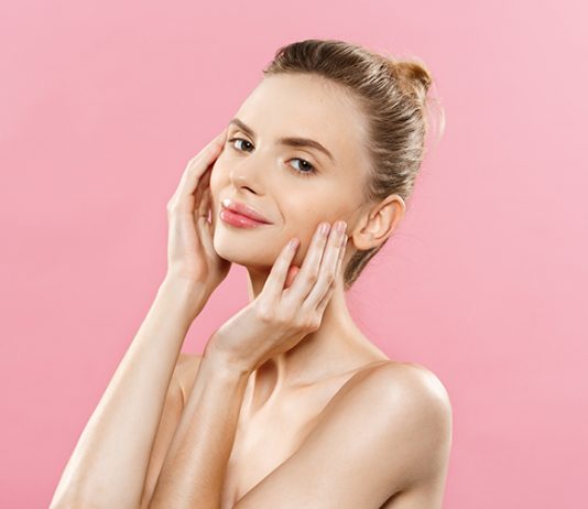 Happy woman with glowy skin