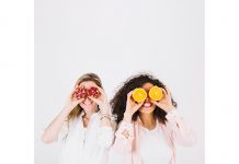 Help Yourself to a Healthy Diet for Stress Relief Two happy women having fruits for stress relief
