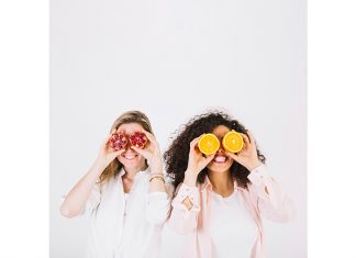 Help Yourself to a Healthy Diet for Stress Relief Two happy women having fruits for stress relief